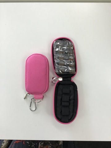 Pink keychain with sample vials
